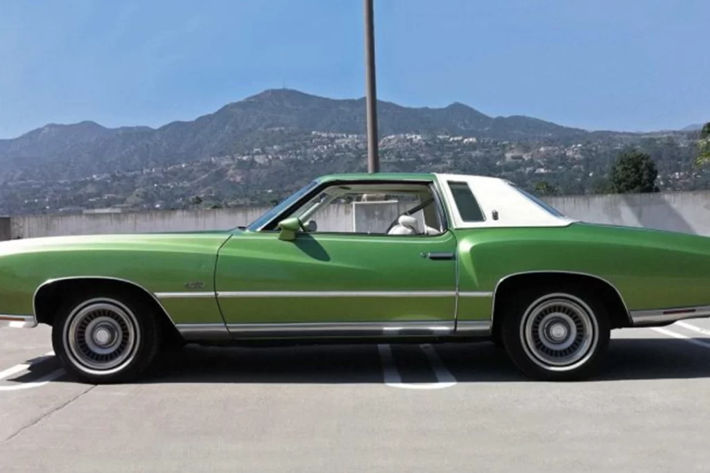 A green 1976 Chevy Monte Carlo